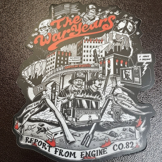 Sticker with 'The War Years' design on a dark surface alternate view