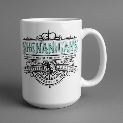 White mug with green and black text and design on a wooden surface