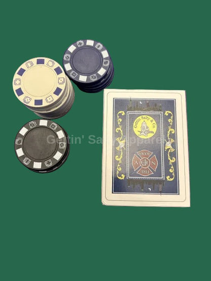 Poker chips and a playing card