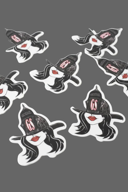 Stickers with a design of a woman brunette firefighter wearing a helmet with 'GS' initials