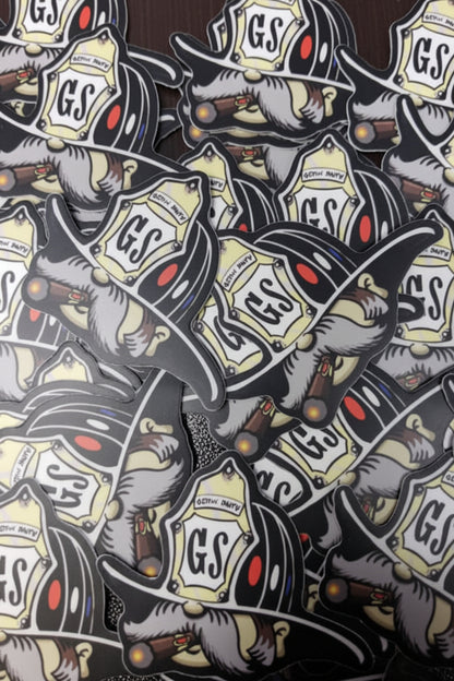 Pattern of firefighter helmets with 'GS' logo on a dark background