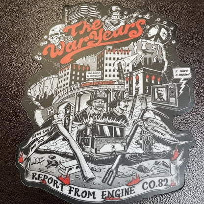 Sticker with 'The War Years' design on a dark surface