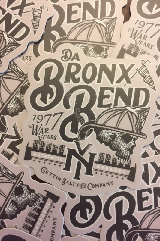 Sticker with 'Da Bronx Bend' design featuring text and graphics on a textured background.