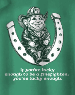 Green t-shirt with a graphic of a leprechaun in a firefighter helmet and a horseshoe, with text on a green background. alternate view
