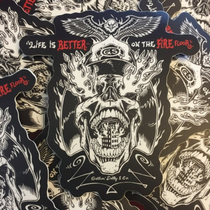 Skull-themed sticker with Life Is Better on the Fire floor