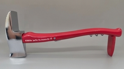 A red and silver hand axe with a textured red handle and a polished steel head, photographed against a neutral gray background.