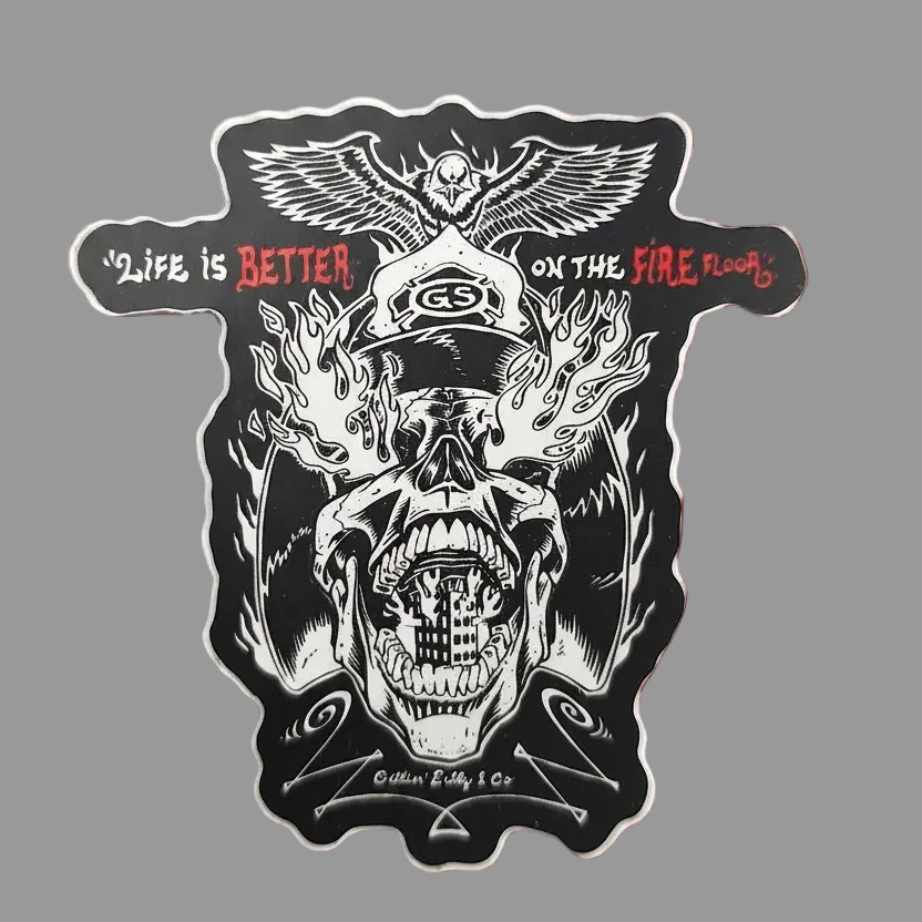 A die-cut sticker featuring a black and white illustrated skull with flames, an eagle, and red text reading 'Life is BETTER ON THE FIRE FLOOR', shown on a plain light gray background.